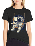 Astronaut on Swing Graphic Tee - Space Adventure T-Shirt