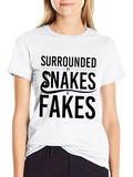 Surrounded By Snakes & Fakes Graphic Tee