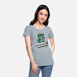 Green Kaiju Drinking Cocktail on Beach